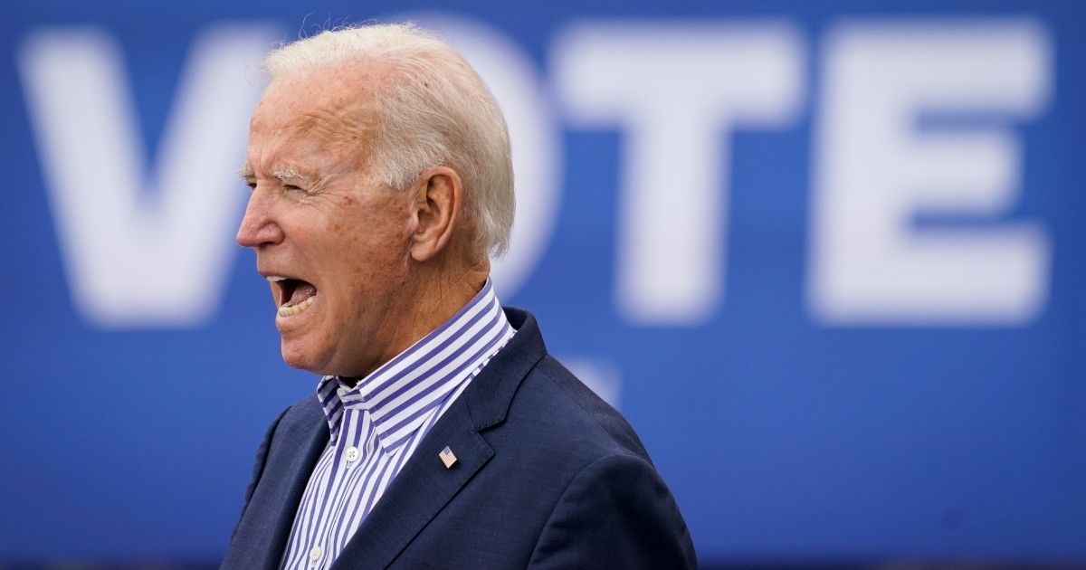 Democratic presidential nominee Joe Biden speaks during a drive-in campaign rally at Bucks County Community College on Saturday in Bristol, Pennsylvania.