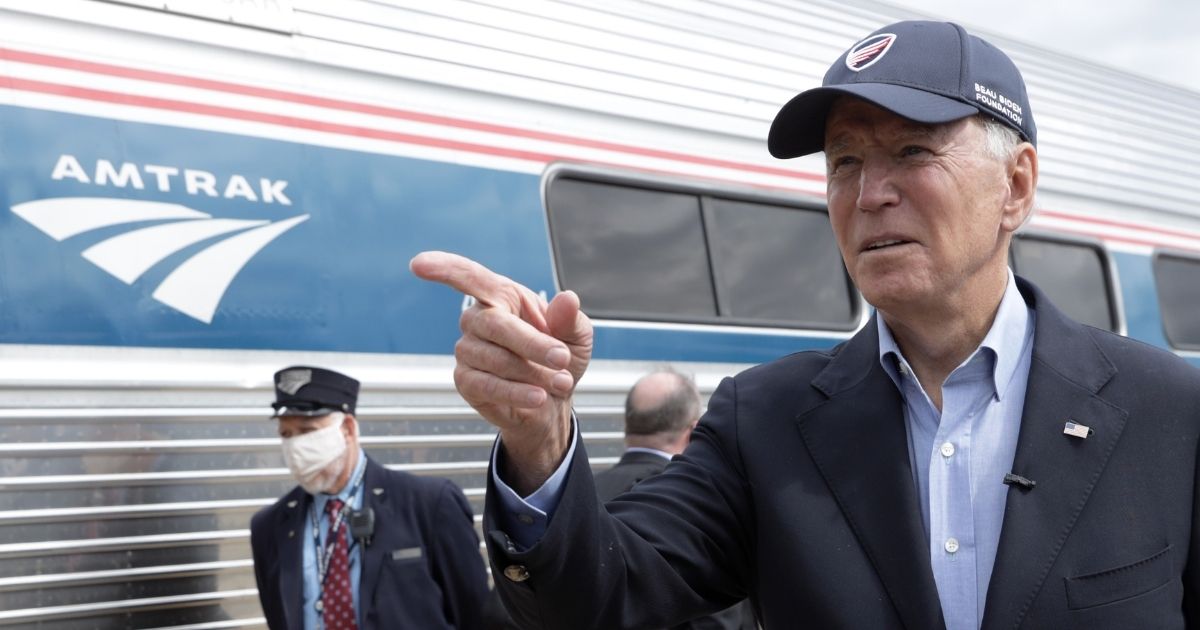Democratic presidential nominee Joe Biden gestures during a campaign stop at Alliance Amtrak Station in Alliance, Ohio, on Thursday.