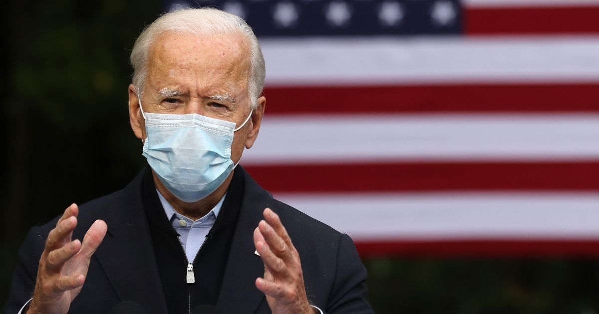 Democratic presidential nominee Joe Biden delivers remarks in the parking lot of the United Food and Commercial Workers International Union Local 951 while campaigning in Grand Rapids, Michigan, on Friday.