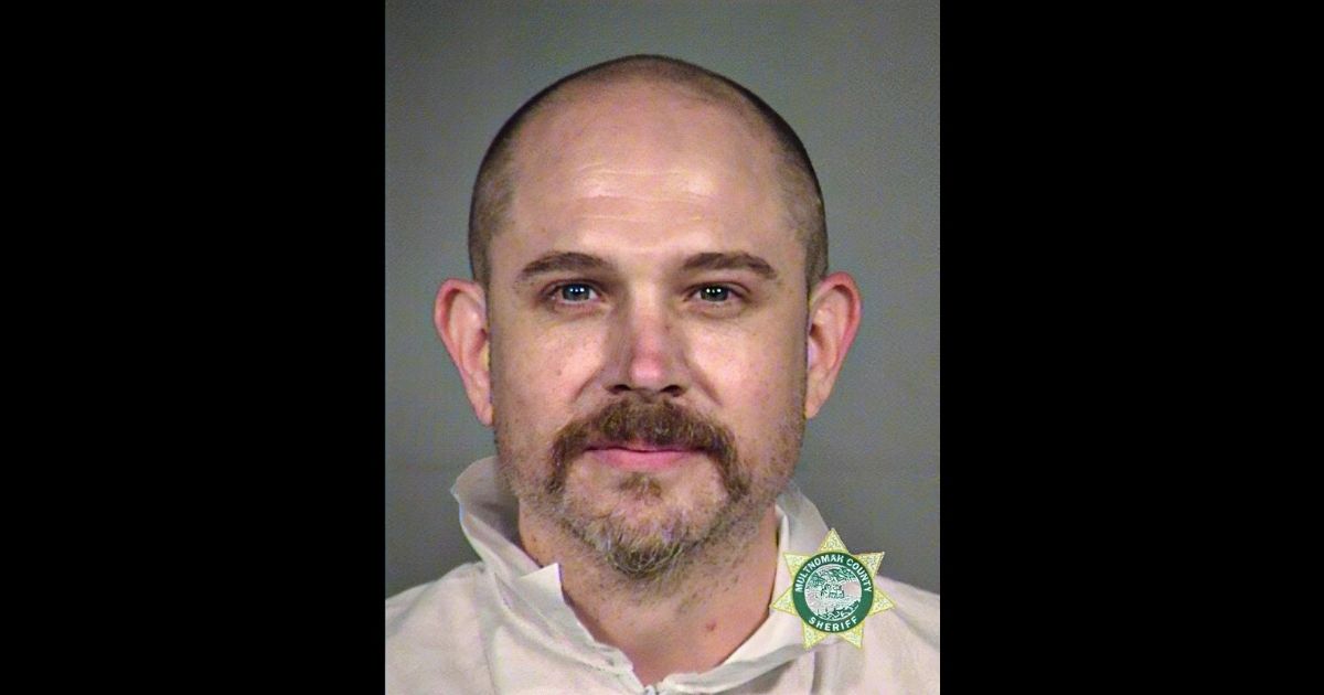 John B. Russell of Portland, Oregon, was arrested on Sunday after allegedly assaulting a police officer.