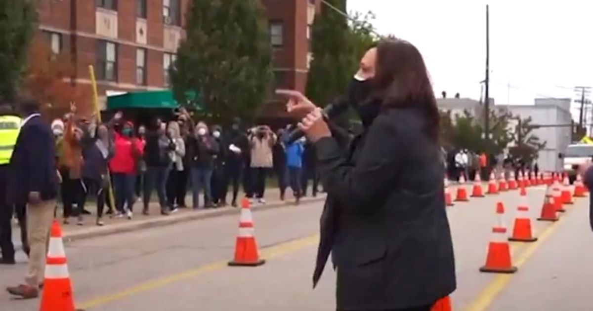 Democratic vice-presidential candidate Kamala Harris stopped outside the Cuyahoga County Board of Elections in Cleveland to speak to voters in line Saturday.