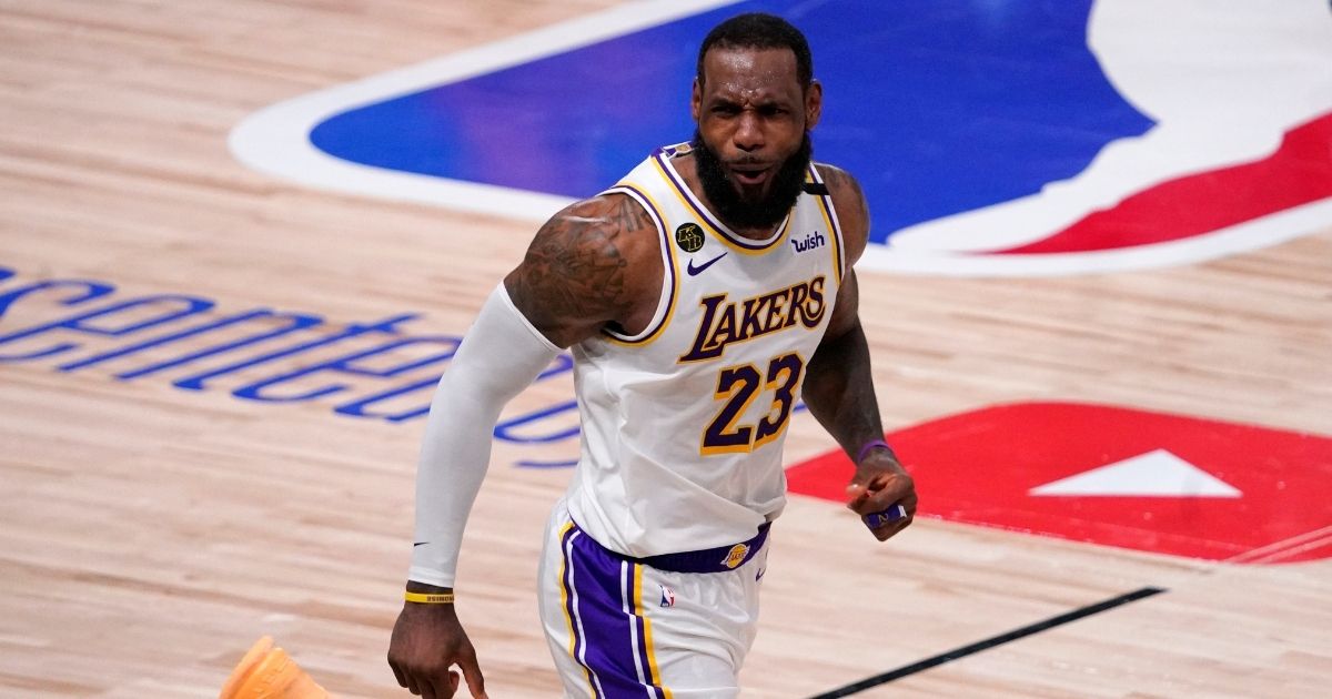 Los Angeles Lakers LeBron James star celebrates during the second half in Game 6 of basketball's NBA Finals against the Miami Heat on Oct. 11, 2020, in Lake Buena Vista, Florida.