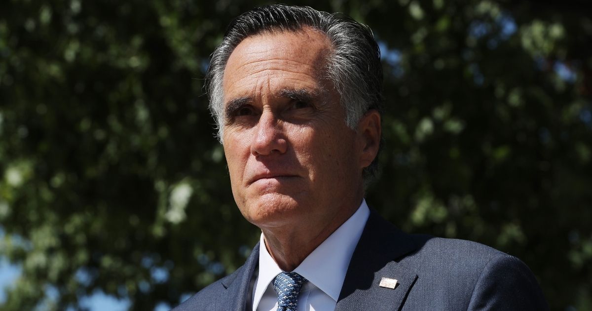 Republican Sen. Mitt Romney of Utah leaves a meeting of GOP senators at the National Republican Senatorial Committee offices on Sept. 22, 2020, in Washington, D.C.
