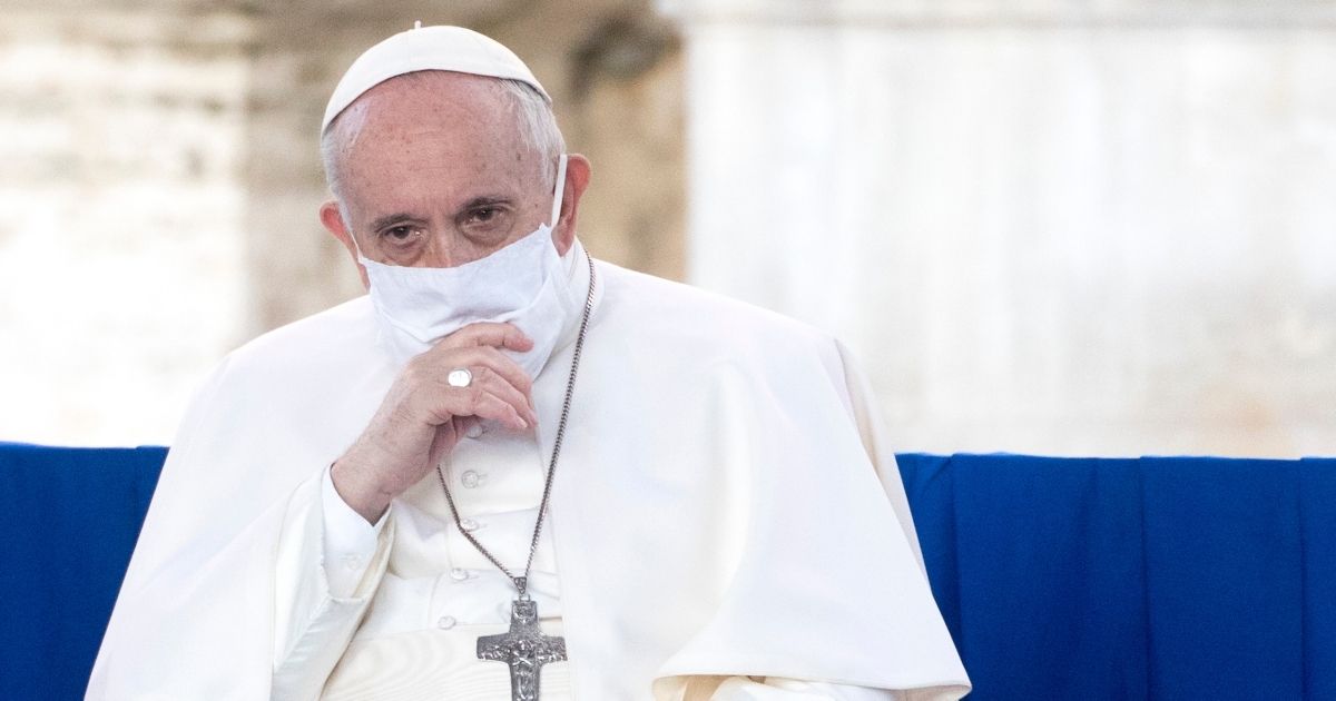 Pope Francis wears a protective mask as he attends an international Prayer for Peace initiative entitled "No One Is Saved Alone - Peace and Fraternity" at the Capitoline Hill on Tuesday in Rome, Italy.