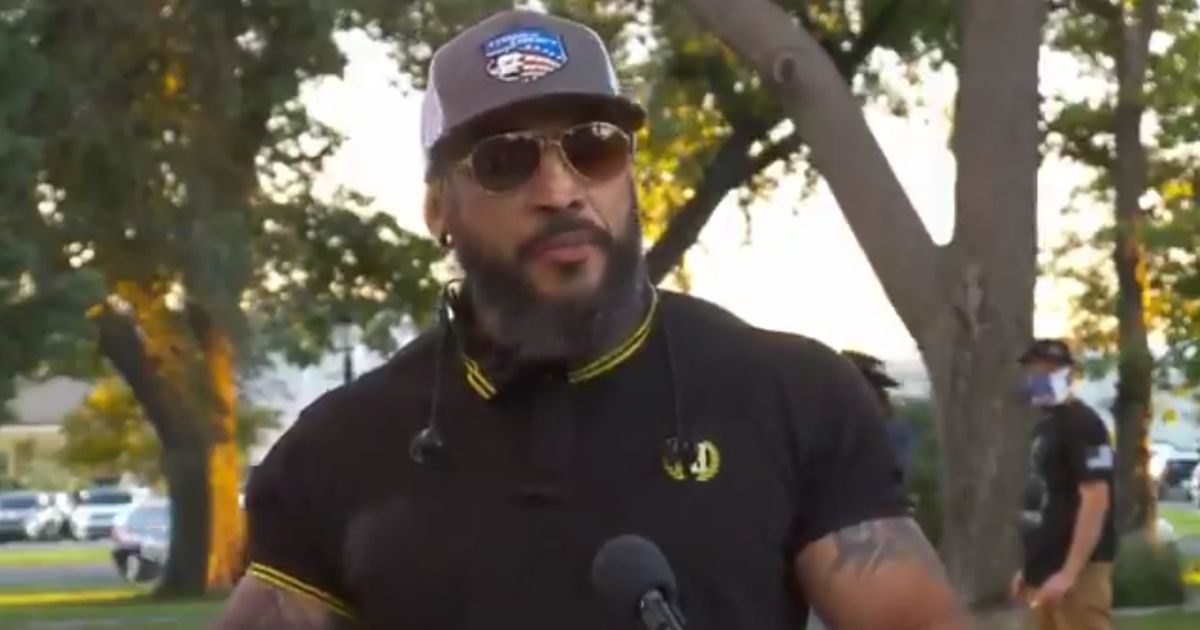 A local Proud Boys chapter leader named Thad speaks to the media in Salt Lake City on Wednesday.