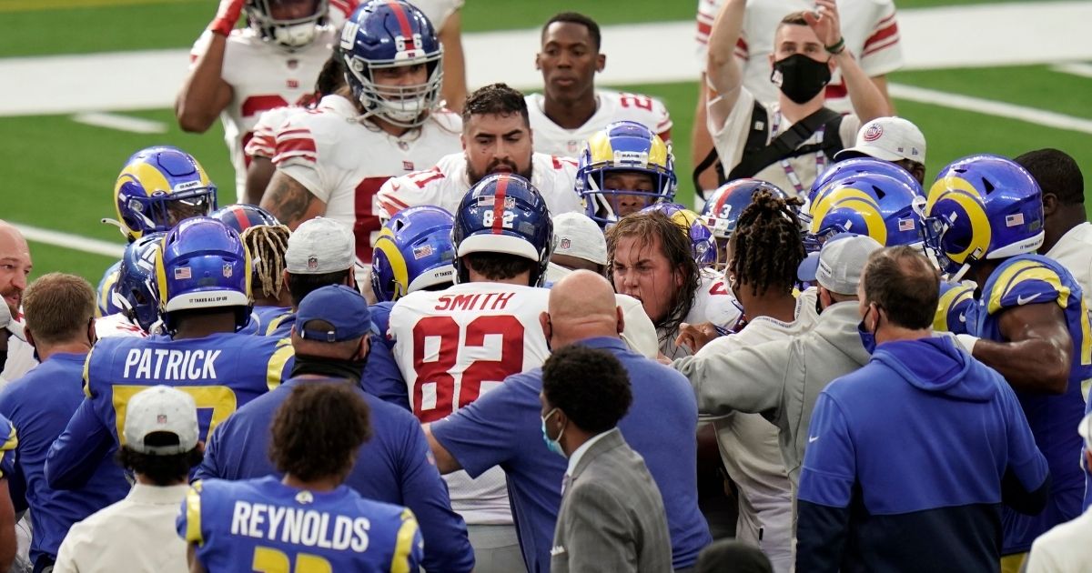 Players from the New York Giants and Los Angeles Rams scuffle at the end of their game Oct. 4, 2020, in Inglewood, California.