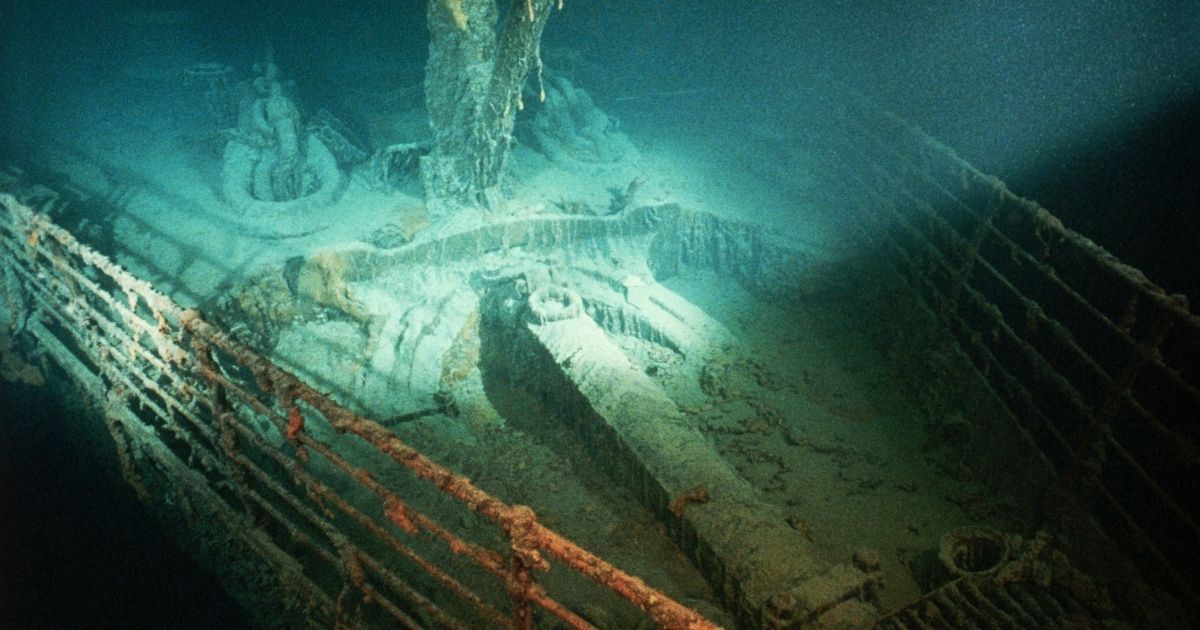 A spare anchor sits in its well on the forepeek of the shipwrecked Titanic in the above stock image.