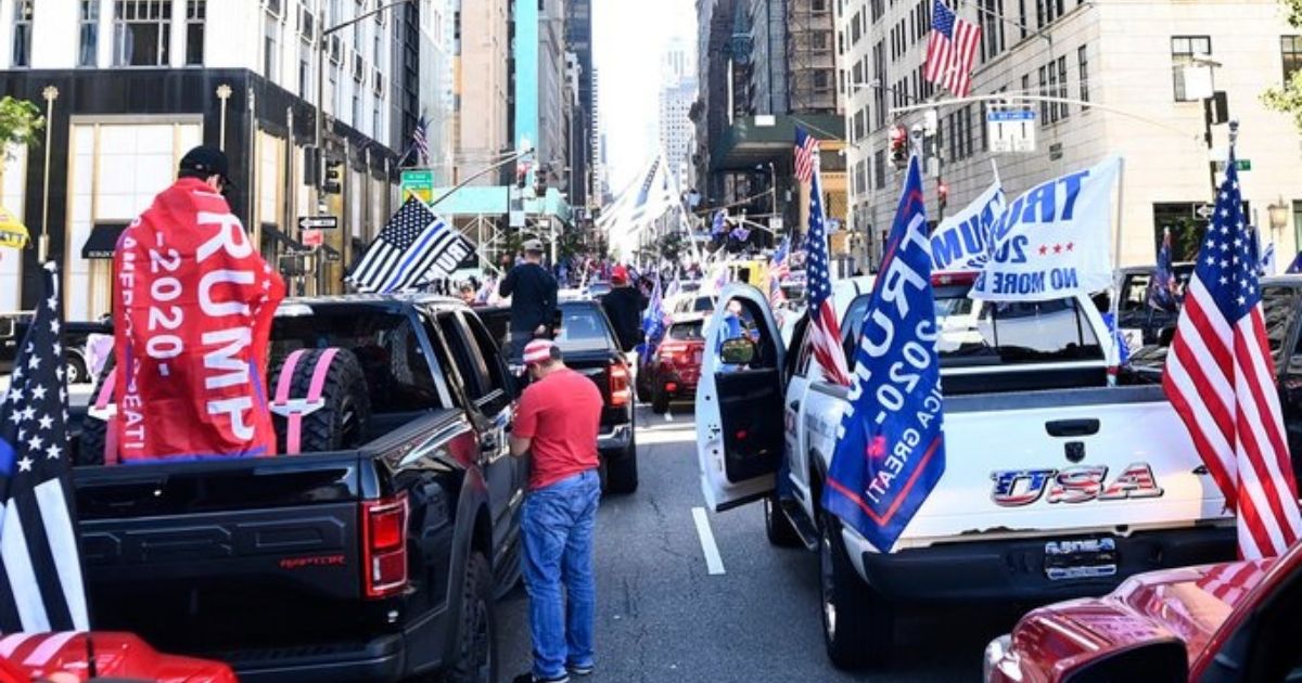 New York supporters of President Donald Trump parade down Manhattan's Fifth Avenue.