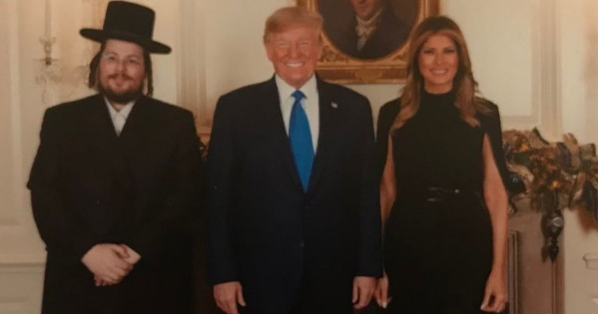 Rabbi Moshe Margaretten meets with President Donald Trump and first lady Melania Trump.