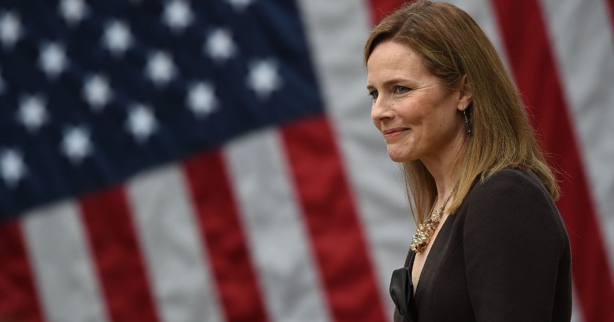 TOPSHOT - Judge Amy Coney Barrett is nominated to the US Supreme Court by President Donald Trump in the Rose Garden of the White House in Washington, DC on September 26, 2020. - Barrett, if confirmed by the US Senate, will replace Justice Ruth Bader Ginsburg, who died on September 18.