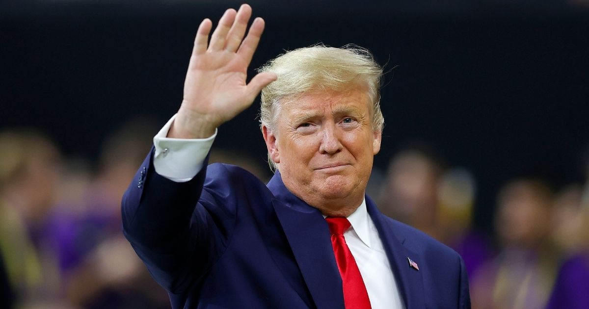 NEW ORLEANS, LOUISIANA - JANUARY 13: U.S. President Donald Trump waves prior to the College Football Playoff National Championship game between the Clemson Tigers and the LSU Tigers at Mercedes Benz Superdome on January 13, 2020 in New Orleans, Louisiana.