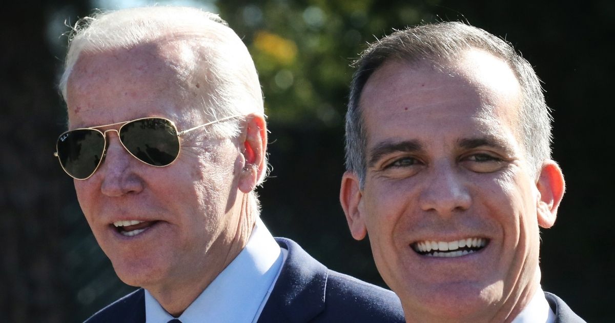 LOS ANGELES, CALIFORNIA - JANUARY 10: Democratic presidential candidate former U.S. Vice President Joe Biden (L) walks with Los Angeles Mayor Eric Garcetti at a campaign event at United Firefighters of Los Angeles City on January 10, 2020 in Los Angeles, California. Garcetti endorsed Biden yesterday.