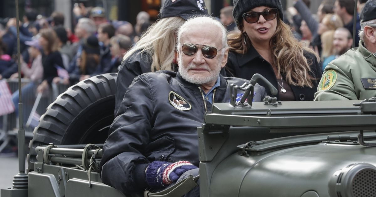 Legendary astronaut Buzz Aldrin rides in a jeep during the 2019 Veterans Day Parade in New York City.
