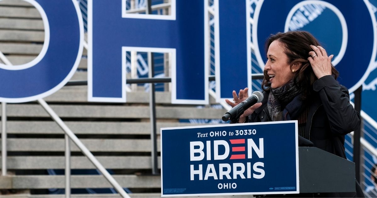 Democratic Vice President nominee Sen. Kamala Harris speaks to a small crowd outside Cuyahoga Community College on Saturday in Cleveland.