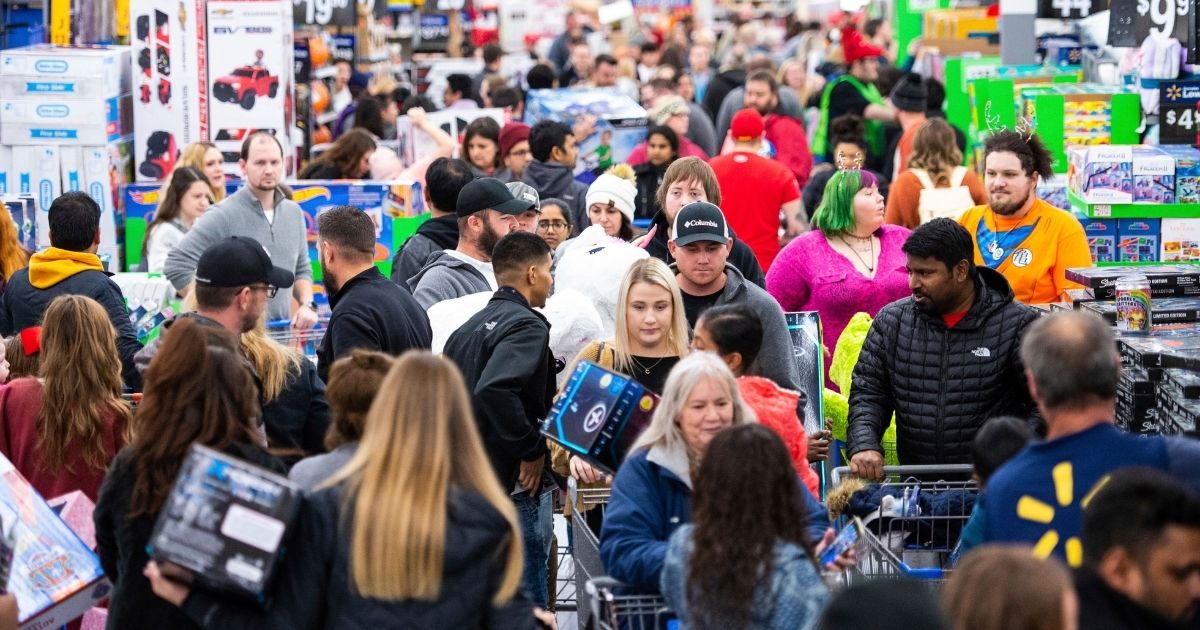 Customers stock up on electronics, toys, apparel and home goods at Walmart's Black Friday store event Nov. 28, 2019, in Bentonville, Arkansas.