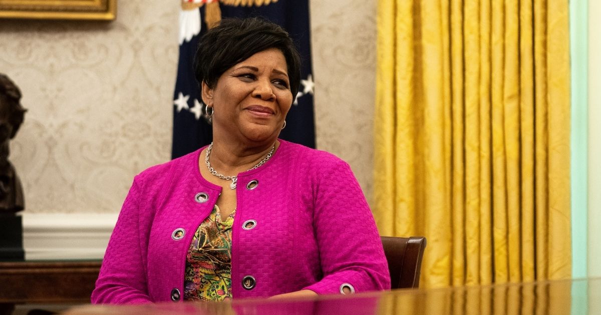 Alice Johnson listens during an event in the Oval Office of the White House on Aug. 28, 2020, in Washington, D.C.