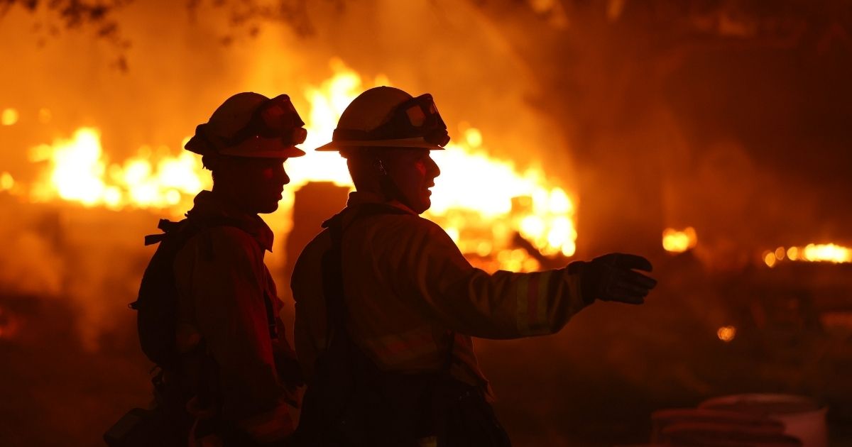 Firefighters battle a blaze on Oct. 1, 2020, in Calistoga, California.