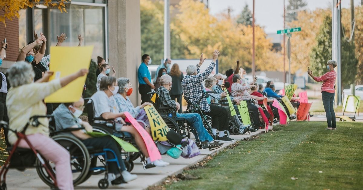 A group of seniors held a protest outside their Colorado nursing home on Oct. 8, 2020, over coronavirus restrictions.