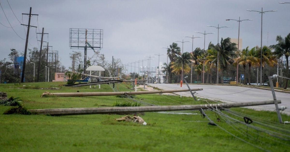 Fallen power lines are seen after the passage of Hurricane Delta in Cancun, Mexico, on Oct. 7, 2020. Hurricane Delta slammed into Mexico's Caribbean coast, toppling trees, ripping down power lines and lashing a string of major beach resorts with winds of up to 110 mph.