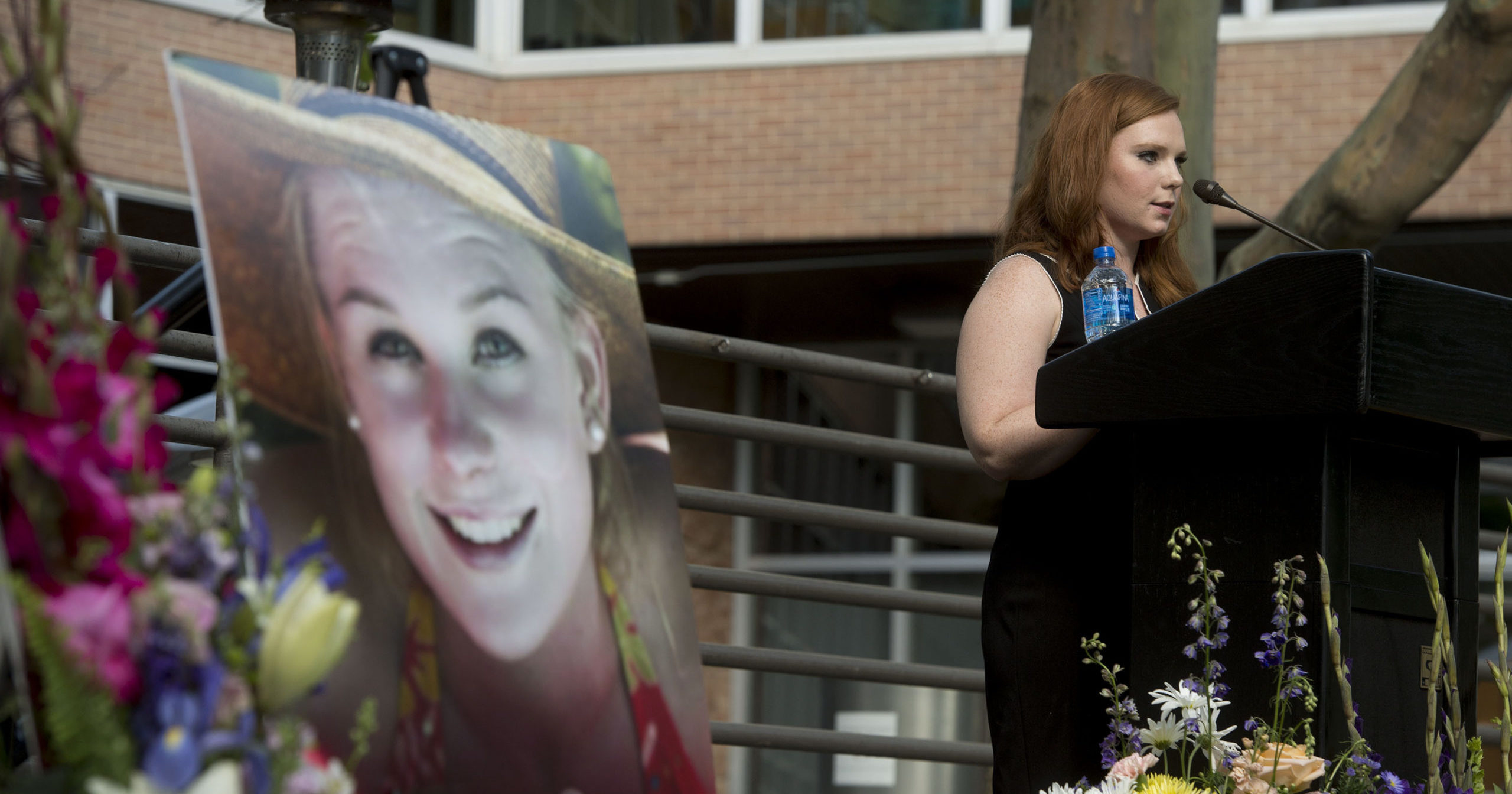 In this July 1, 2019, file photo, Ashley Fine speaks during a vigil for Mackenzie Lueck in Salt Lake City.