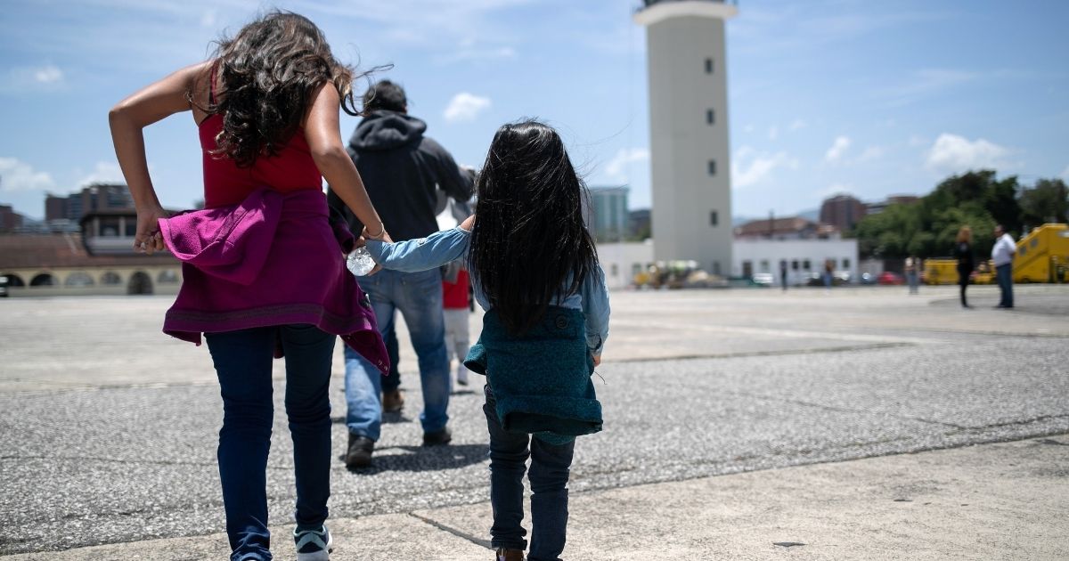 Guatemalan youth board an ICE deportation flight from Brownsville, Texas, on Aug. 29, 2019, to Guatemala City.