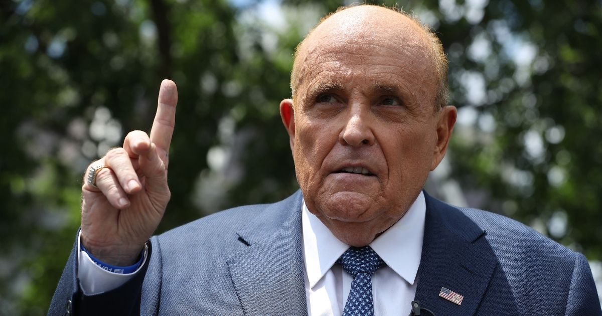 President Donald Trump's lawyer and former New York City Mayor Rudy Giuliani talks to journalists outside the White House on July 1, 2020, in Washington, D.C.