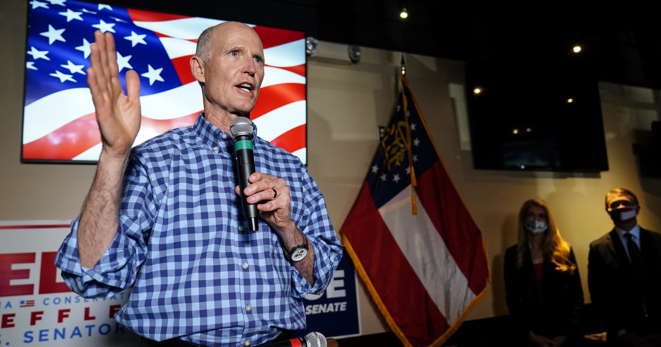 Sen. Rick Scott speaks during a campaign rally for Republican candidates for US Senate Sen. Kelly Loeffler and Sen. David Perdue on Nov. 13, 2020, in Cumming, Georgia.