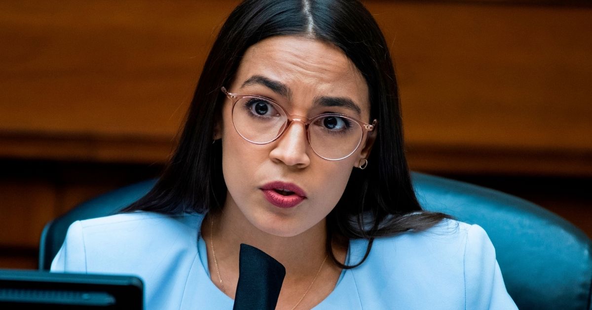 Democratic Rep. Alexandria Ocasio-Cortez of New York questions Postmaster General Louis DeJoy during a House Oversight and Reform Committee hearing on Aug. 24, 2020.