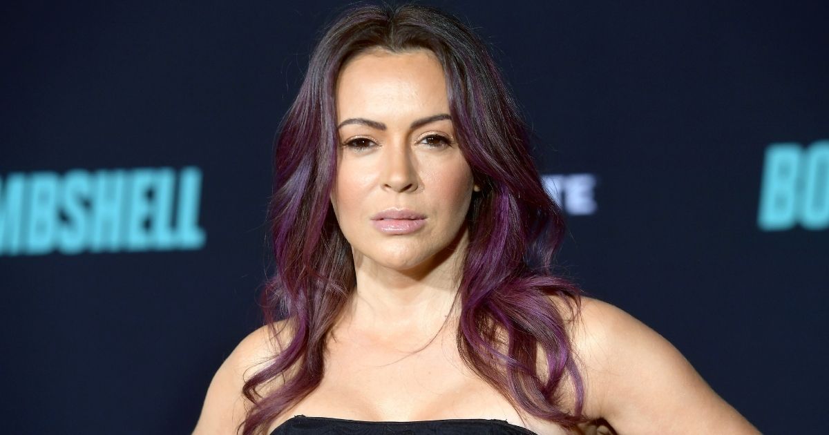 Alyssa Milano attends a special screening of Liongate's "Bombshell" at Regency Village Theatre on Dec. 10, 2019, in Westwood, California.