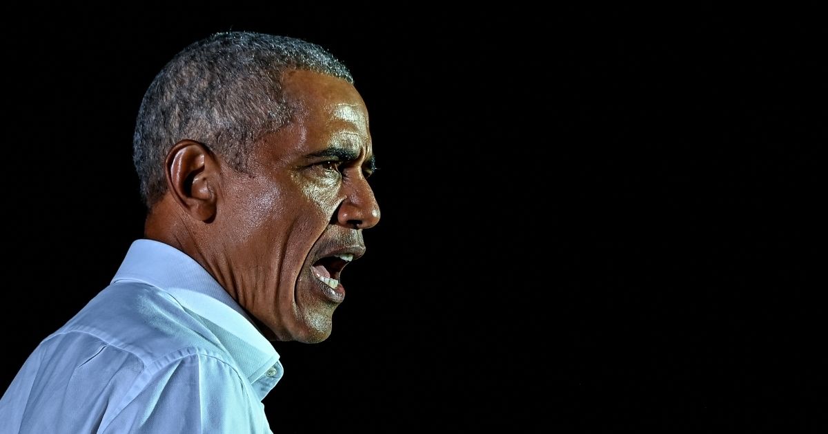 Former President Barack Obama speaks at a drive-in rally as he campaigns for former Vice President Joe Biden in Miami on Nov. 2, 2020.