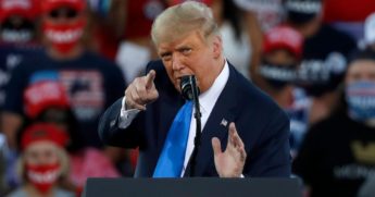 President Donald Trump gestures during a campaign rally in Carson City, Nevada, on Oct. 18.