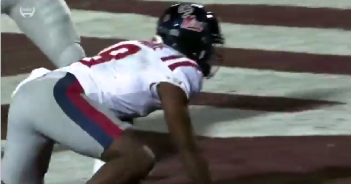 Ole Miss receiver Elijah Moore celebrates his late touchdown at the back of the end zone on Nov. 28, 2019, by lifting his leg and pretending to urinate like a dog. The Rebels were penalized 15 yards for the antics and lost the game.
