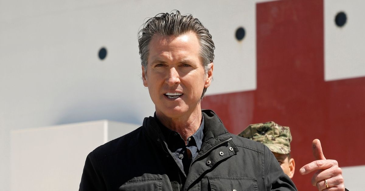 California Gov. Gavin Newsom speaks in front of the hospital ship USNS Mercy that arrived into the Port of Los Angeles on March 27, 2020, to provide relief for Southland hospitals overwhelmed by the coronavirus pandemic.