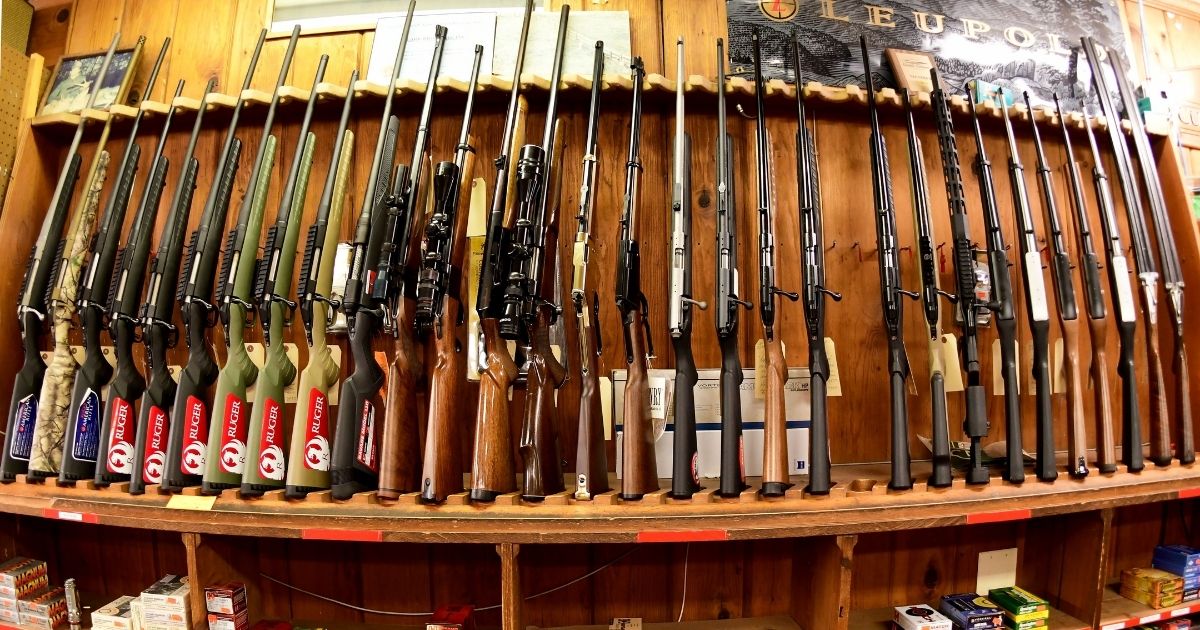 Various rifles are on display at Clark Brothers gun store in Warrenton, Virginia, on Jan. 16.