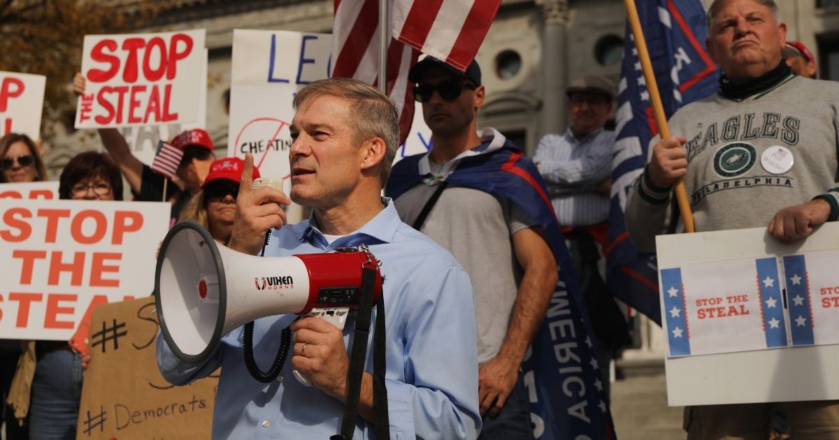 Ohio Republican Rep. Jim Jordan stands with dozens of people calling for stopping the vote count in Pennsylvania due to alleged fraud against President Donald Trump on Nov. 5, 2020, in Harrisburg, Pennsylvania.