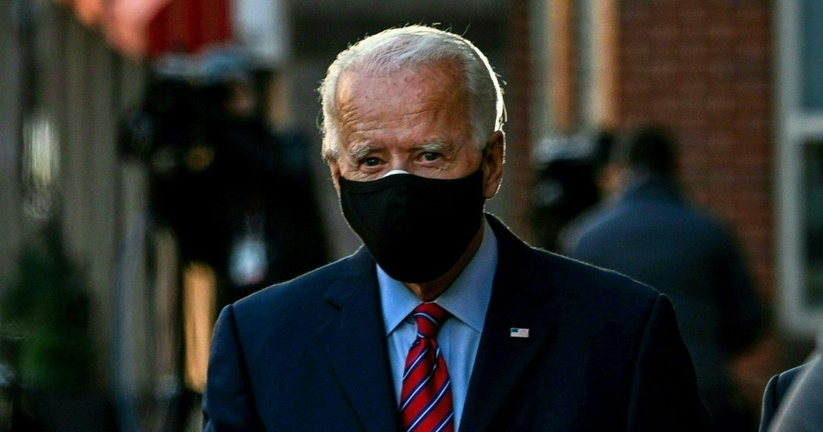 Presumptive president-elect Joe Biden leaves the Queen after meeting virtually with the United States Conference of Mayors in Wilmington, Delaware, on Monday.