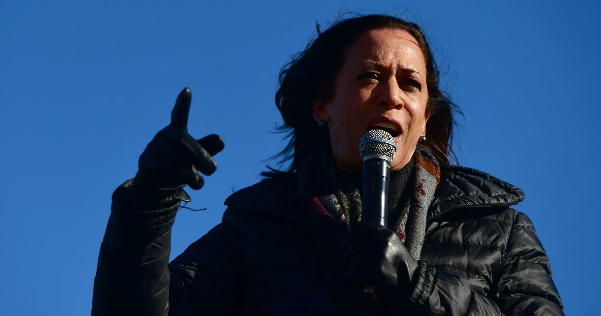 Democratic vice presidential nominee Sen. Kamala Harris addresses supporters during a drive-in rally on the eve of the general election on Monday in Bethlehem, Pennsylvania.