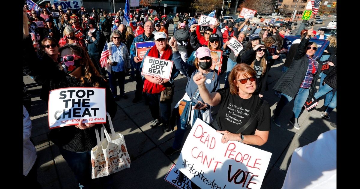 Supporters of President Donald Trump rally outside of the TCF Center in Detroit on Friday to protest what they see as efforts to steal the election for Democrat Joe Biden.