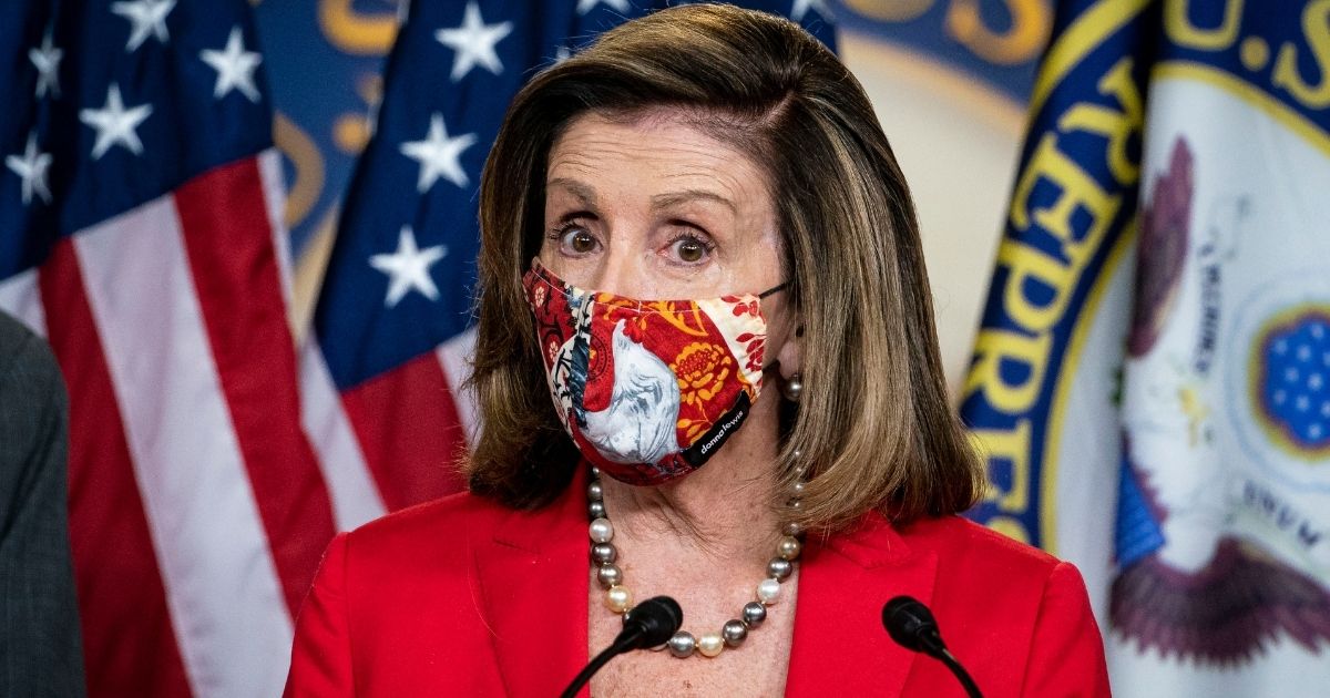 Speaker of the House Nancy Pelosi talks to reporters during her weekly news conference in the House Visitors Center at the U.S. Capitol on Friday. in Washington, D.C.