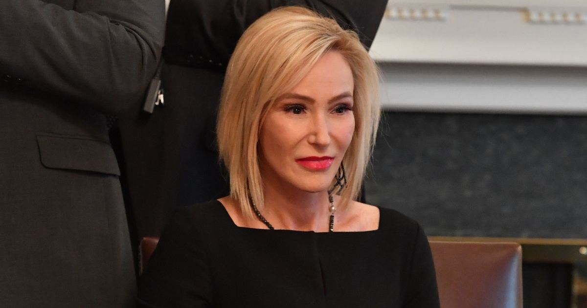 Pastor Paula White looks on during a meeting between President Donald Trump and African-American leaders in the Cabinet Room of the White House on Feb. 27, 2020.
