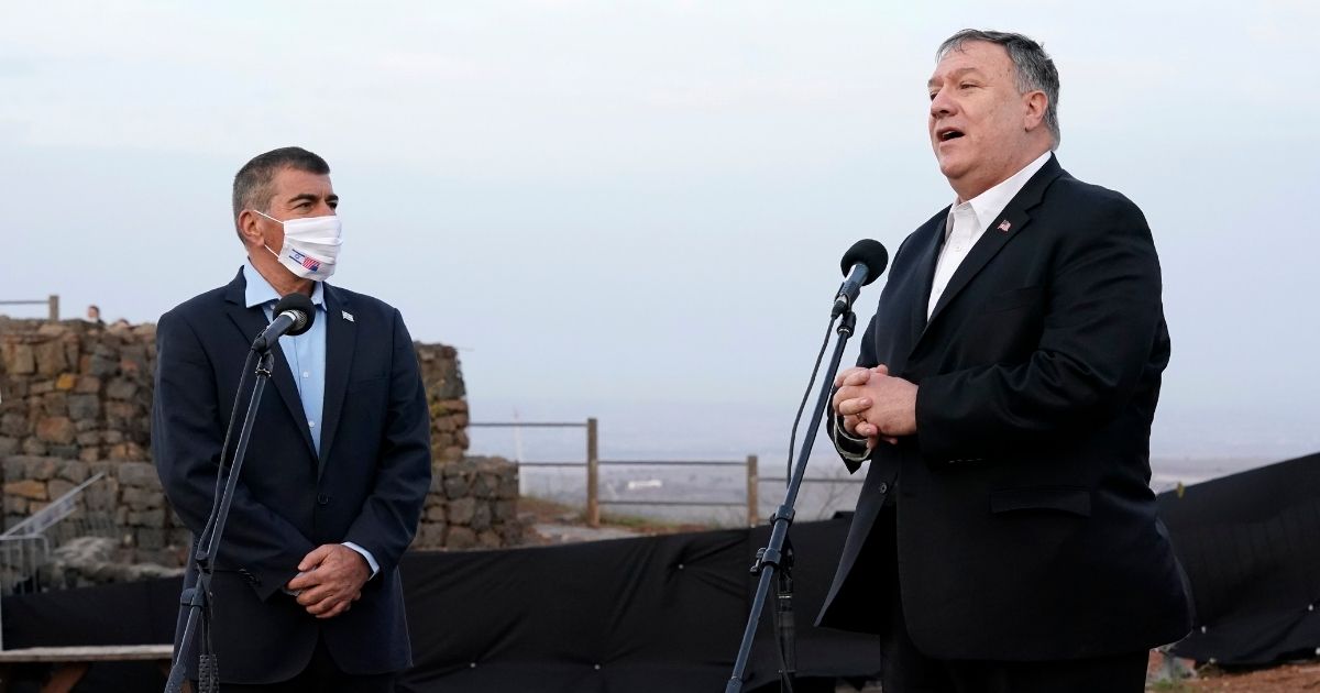 Secretary of State Mike Pompeo, right, speaks alongside Israeli Foreign Minister Gabi Ashkenazi after a security briefing Thursday on Mount Bental in the Israeli-controlled Golan Heights, near the Israeli-Syrian border.