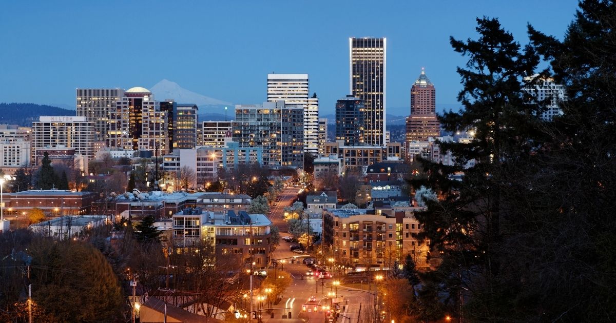 The skyline of Portland, Oregon, is pictured at dusk.