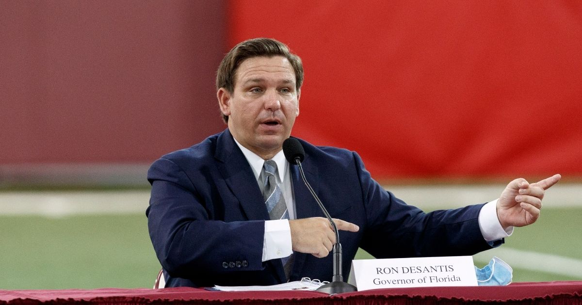 Republican Florida Gov. Ron DeSantis speaks during a collegiate athletics roundtable about fall sports at the Albert J. Dunlap Athletic Training Facility on the campus of Florida State University on Aug. 11 in Tallahassee, Florida.