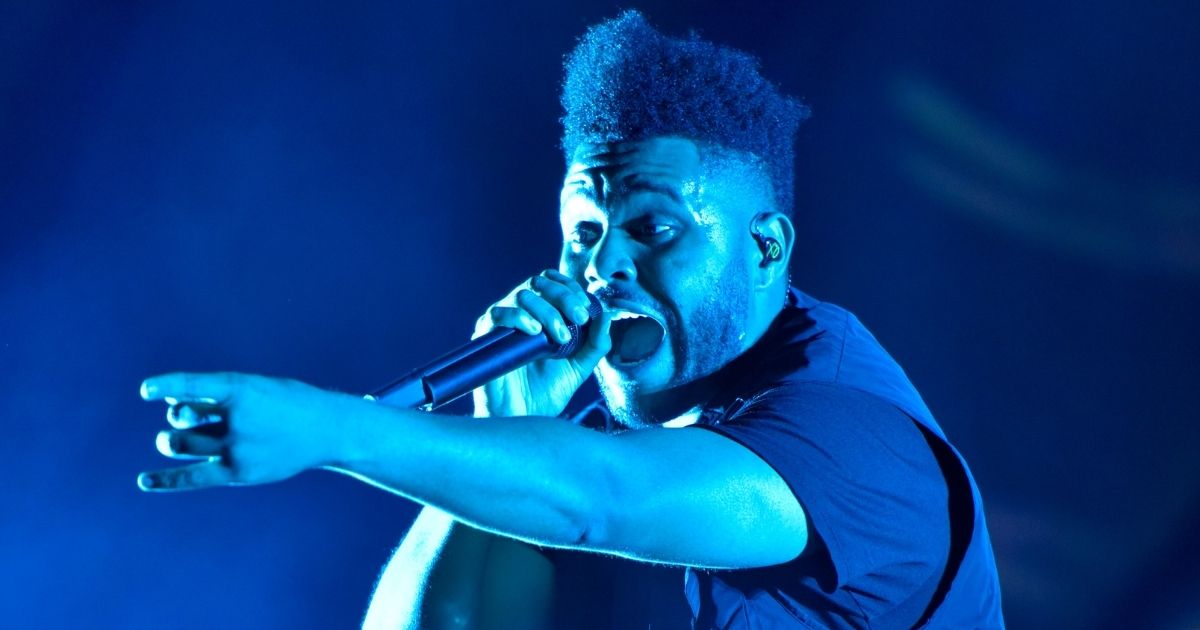 The Weeknd performs on day three at Lollapalooza in Chicago on Aug. 4, 2018.
