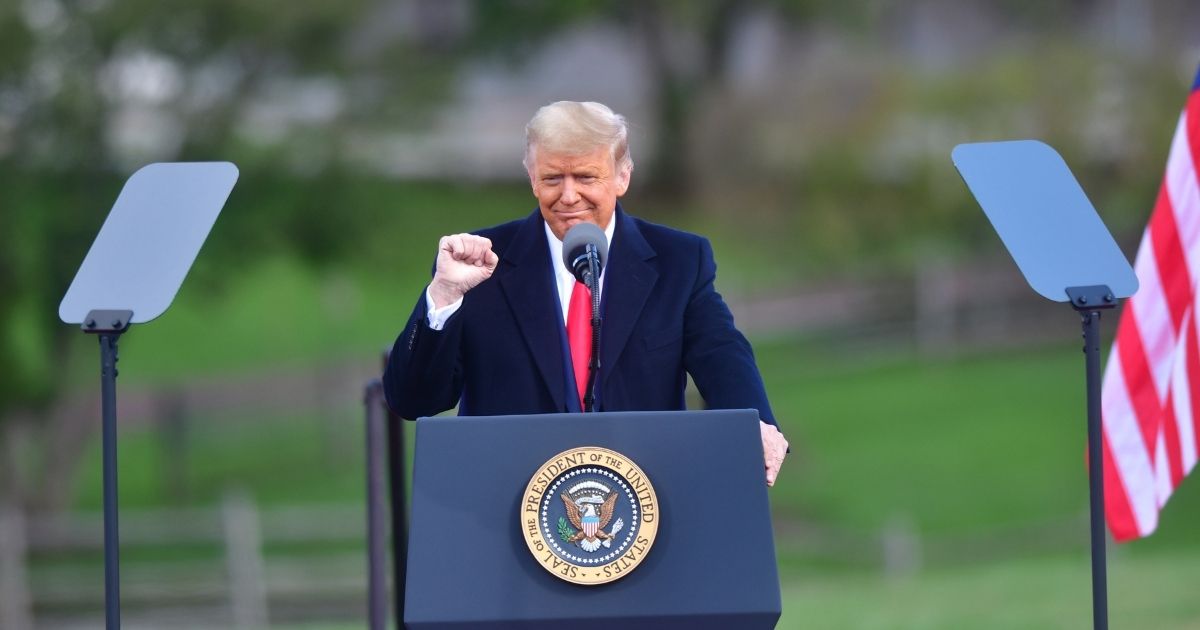 President Donald Trump addresses a rally Saturday in Newtown, Pennsylvania.