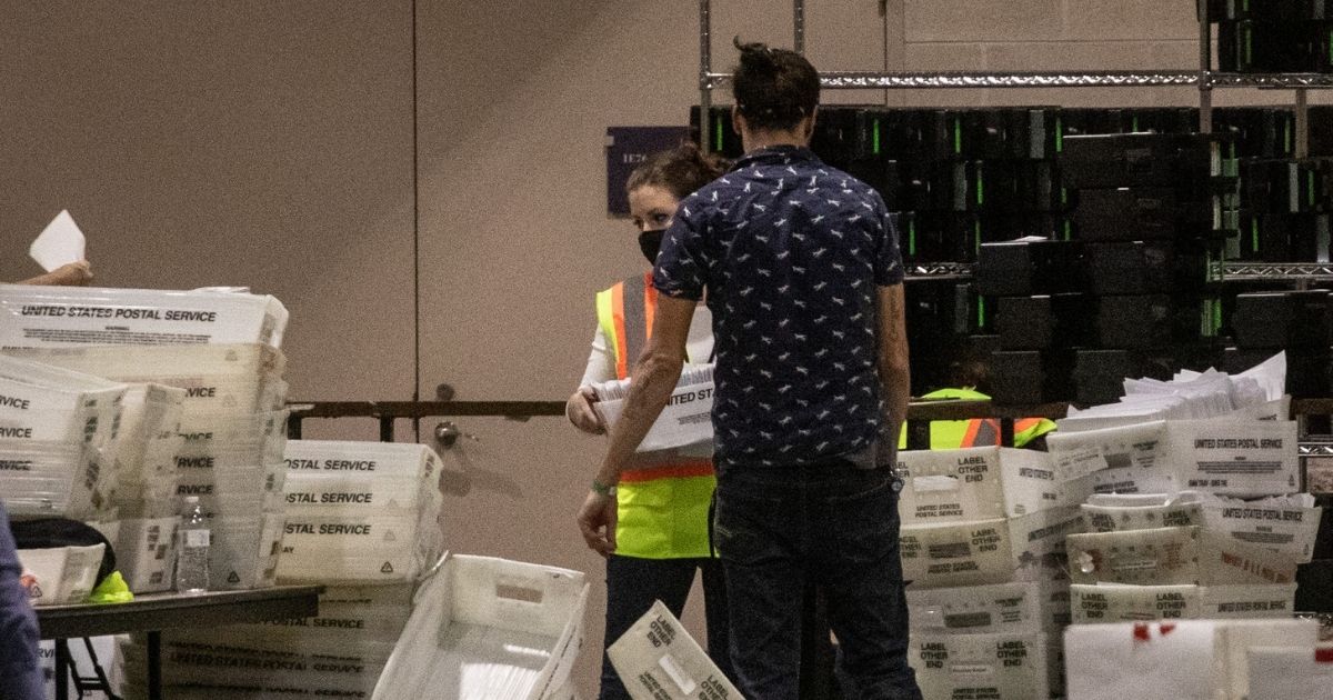 Mail-in ballots are handled at the Philadelphia Convention Center on Election Day.