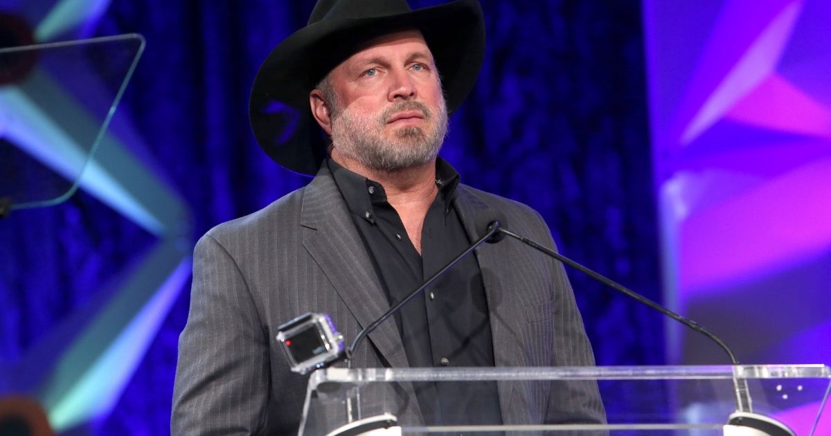 Singer-songwriter Garth Brooks speaks at the 2020 NAMM Show in Anaheim, California, on Jan. 17, 2020. Brooks is known for pursuing national unity, but in this contentious presidential election year, Brooks' unofficial unity campaign hit multiple snags.