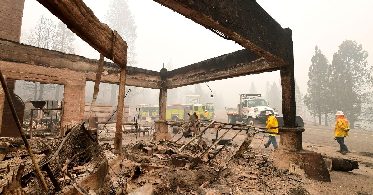 Firefighters are on the scene at Cressman's, a landmark Shaver Lake, California, general store and gas station since 1904. The landmark was destroyed in the Creek Fire wildfire that started in the Sierra Nevada mountains in September 2020. Reese Osterberg, a 9-year-old from Shaver Lake, lost her home during the fire.