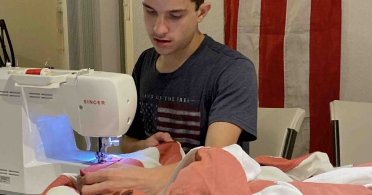Sixteen-year-old Matthew Amatulli repairs an American flag in Palm Beach County, Florida. 'Instead of presents, he would always just want flags for birthdays,' his mother, Angela Amatulli, told WPEC-TV.