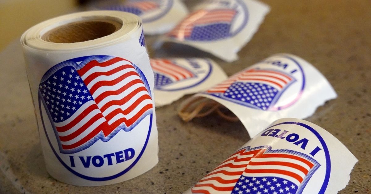 Stickers are ready to be passed out to residents after they vote at the Beloit Public Library on Tuesday in Beloit, Wisconsin.